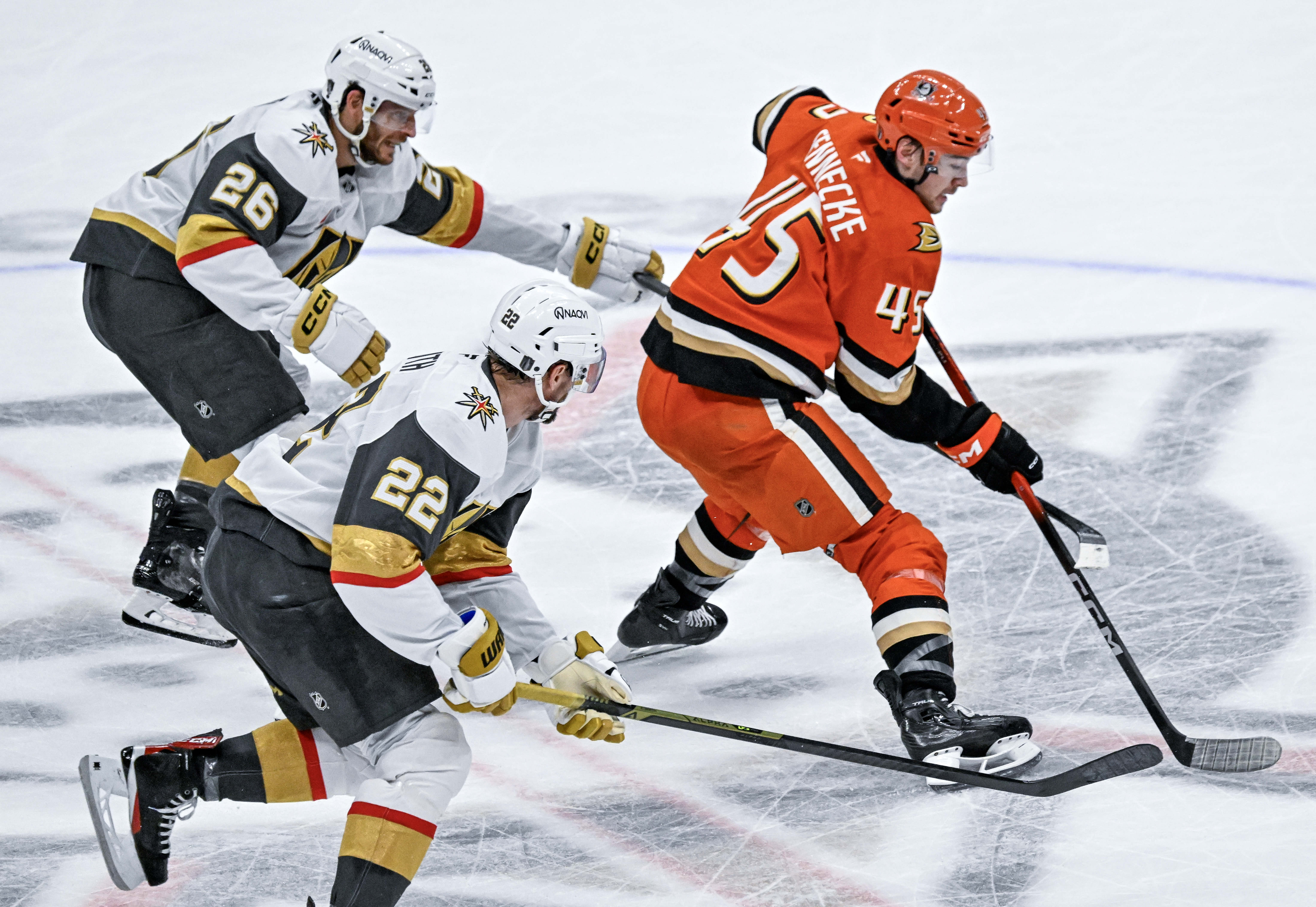 The Ducksâ Beckett Sennecke (45) controls the puck during the...