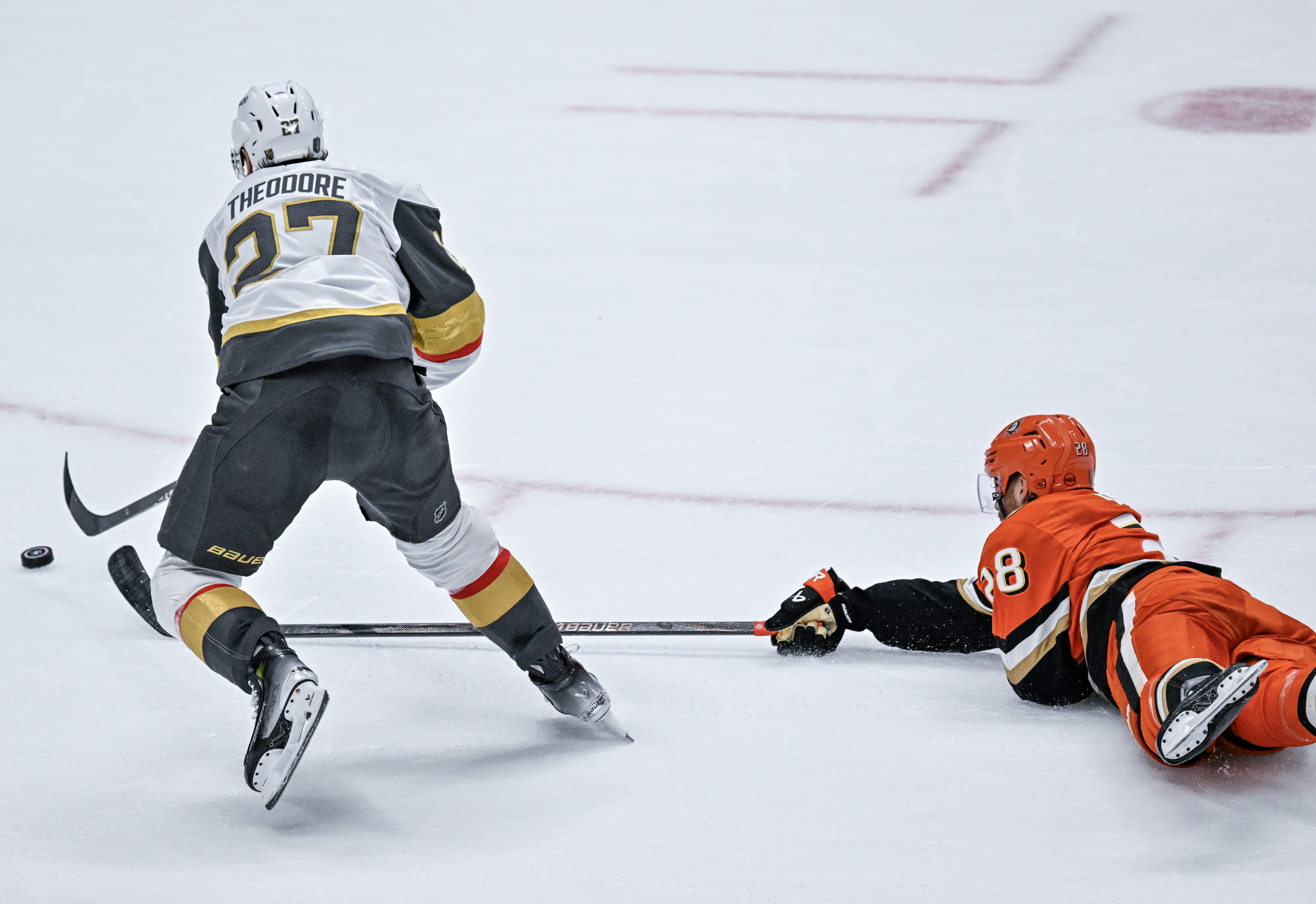 The Ducksâ Jeffrey Viel (28) lays out on the ice...
