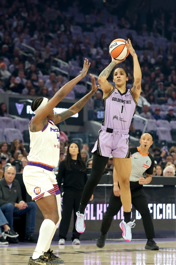 SAN FRANCISCO, CALIFORNIA - MAY 10: Gabby Williams #1 of the Golden State Valkyries shoots over Natasha Mack #4 of the Phoenix Mercury at Chase Center on May 10, 2026 in San Francisco, California. NOTE TO USER: User expressly acknowledges and agrees that, by downloading and or using this photograph, User is consenting to the terms and conditions of the Getty Images License Agreement. (Photo by Ezra Shaw/Getty Images)
