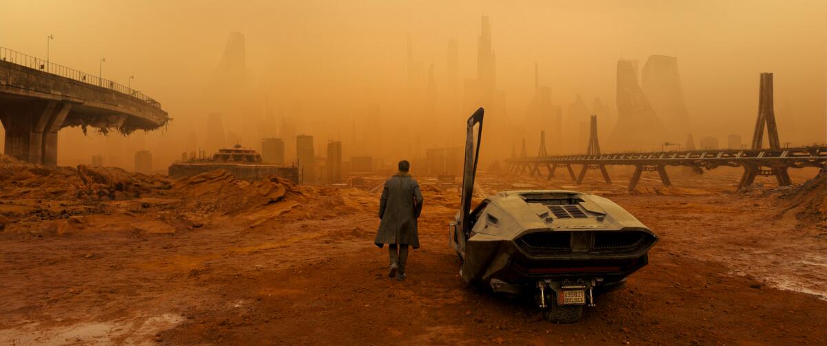Ryan Gosling walking L.A. in Blade Runner 2049