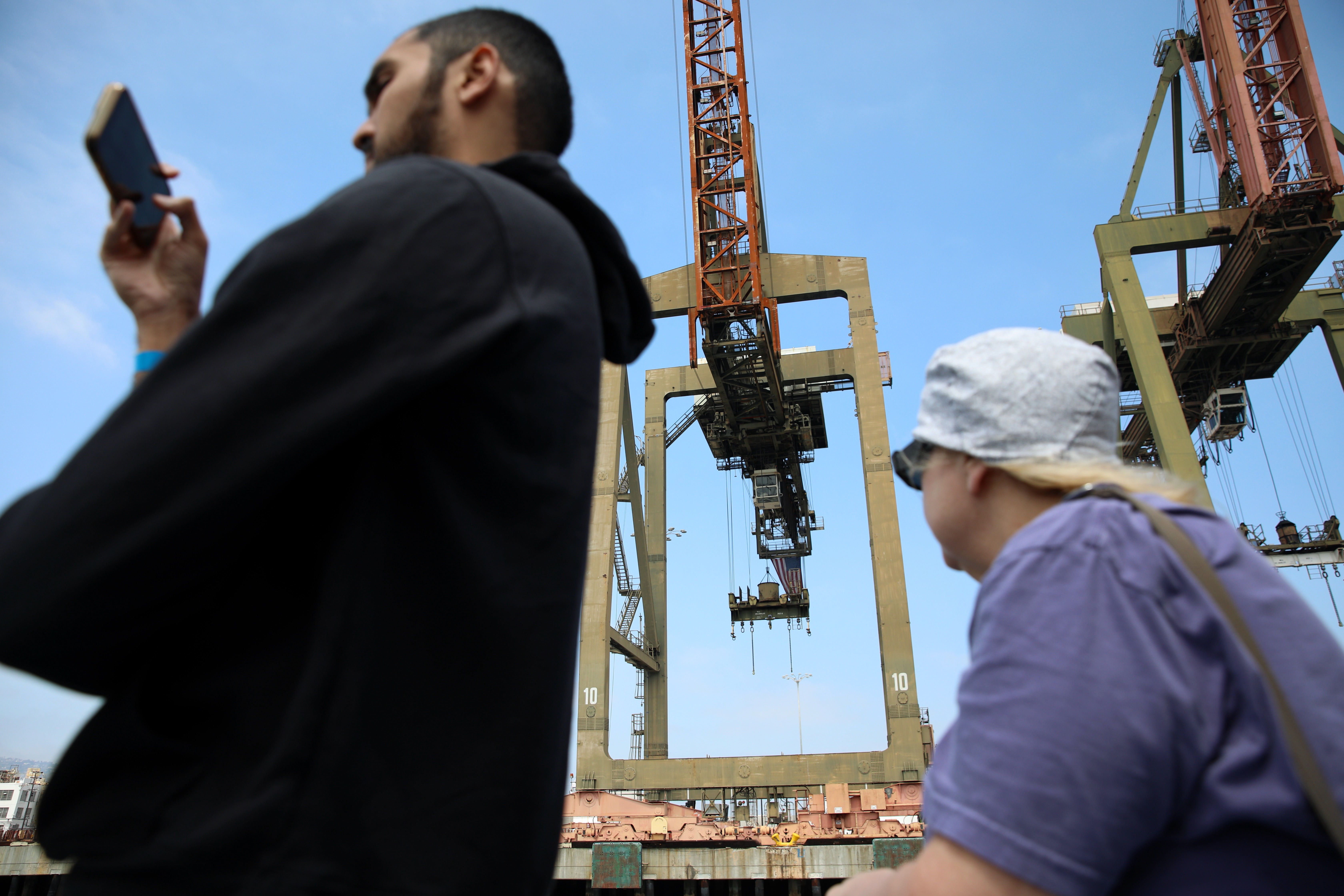 Passengers get close-up views of the ports of Long Beach...