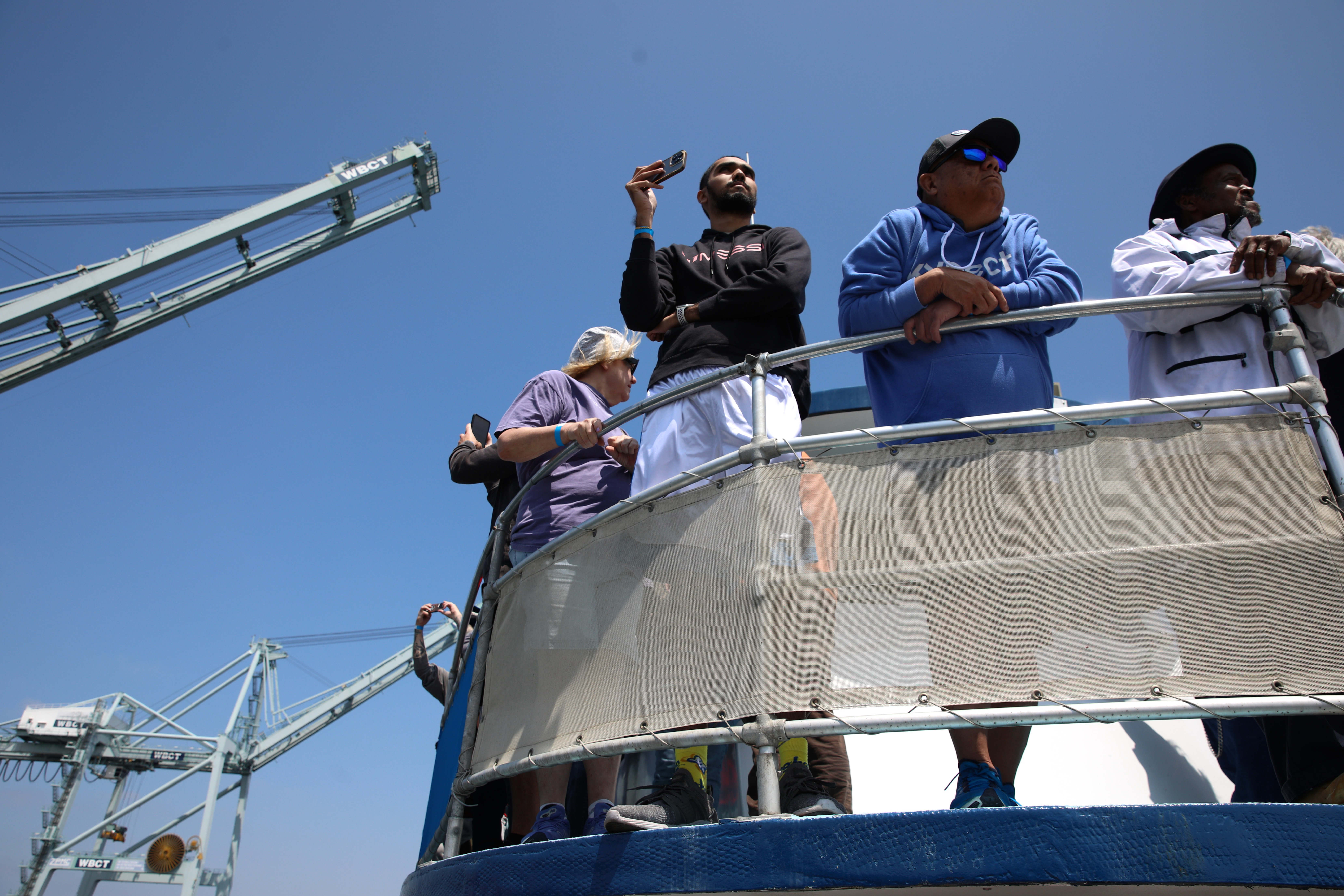 Passengers get close-up views of the ports of Long Beach...