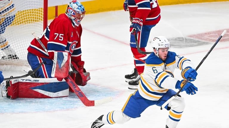 Buffalo Sabres' Zach Benson (6) reacts after scoring against Montreal...