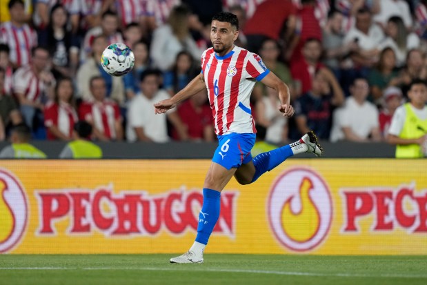 Paraguay's Diego Gomez controls the ball during a FIFA World Cup 2026 qualifying soccer match against Venezuela at Defensores del Chaco Stadium in Asuncion, Paraguay, Tuesday, Oct. 15, 2024. (AP Photo/Jorge Saenz)