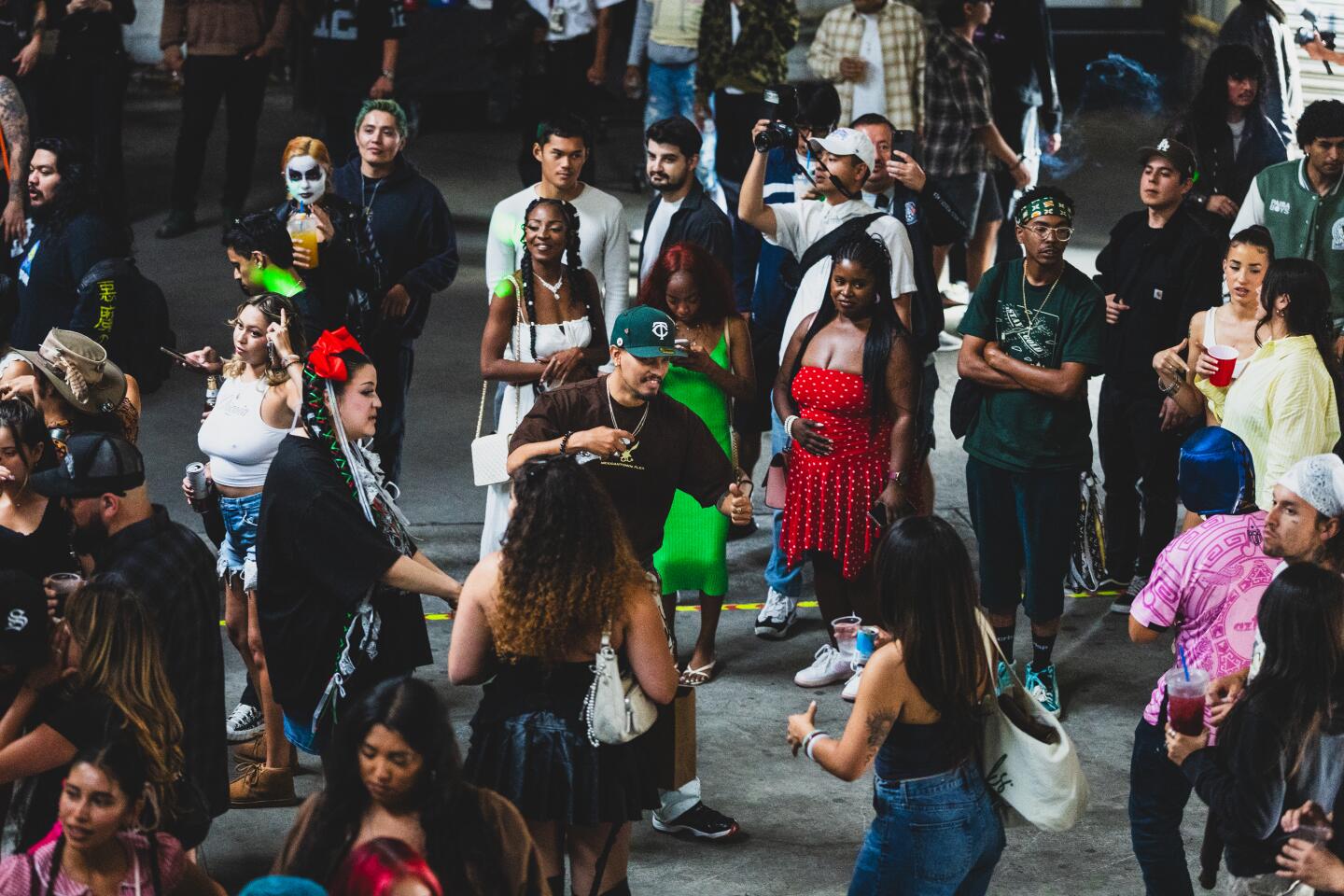 People attend the Lucha Libre Art Show on Sunday, May 3, 2026, in Los Angeles.