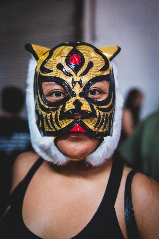 Salma Cruz poses for a portrait at the Lucha Libre Art Show on Sunday, May 3, 2026, in Los Angeles.