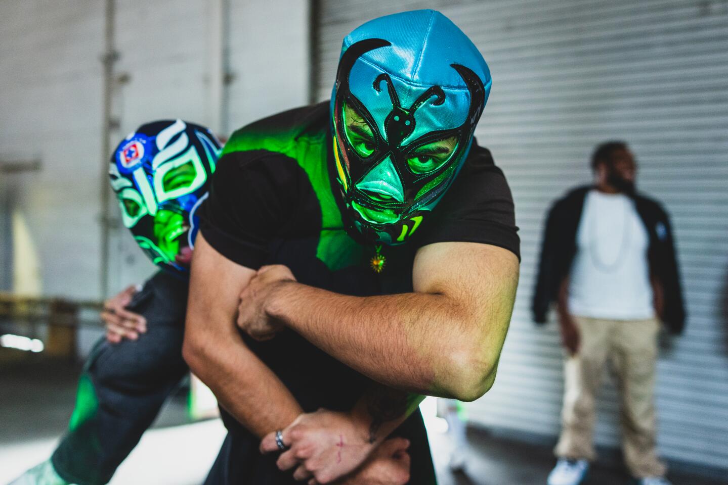 Christian Martinez (left) and Daniel Garcia enjoy the Lucha Experience by MFN Lucha on Sunday, May 3, 2026 in Los Angeles, CA