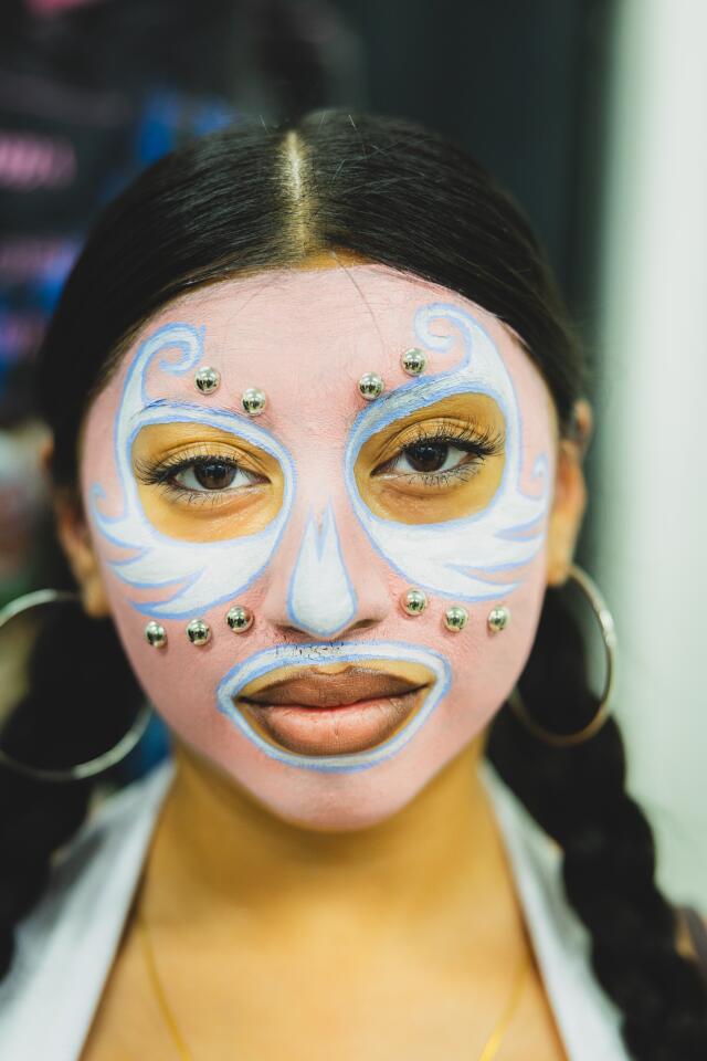 Jenny Sanchez poses for a portrait at the Lucha Libre Art Show on Sunday, May 3, 2026, in Los Angeles.