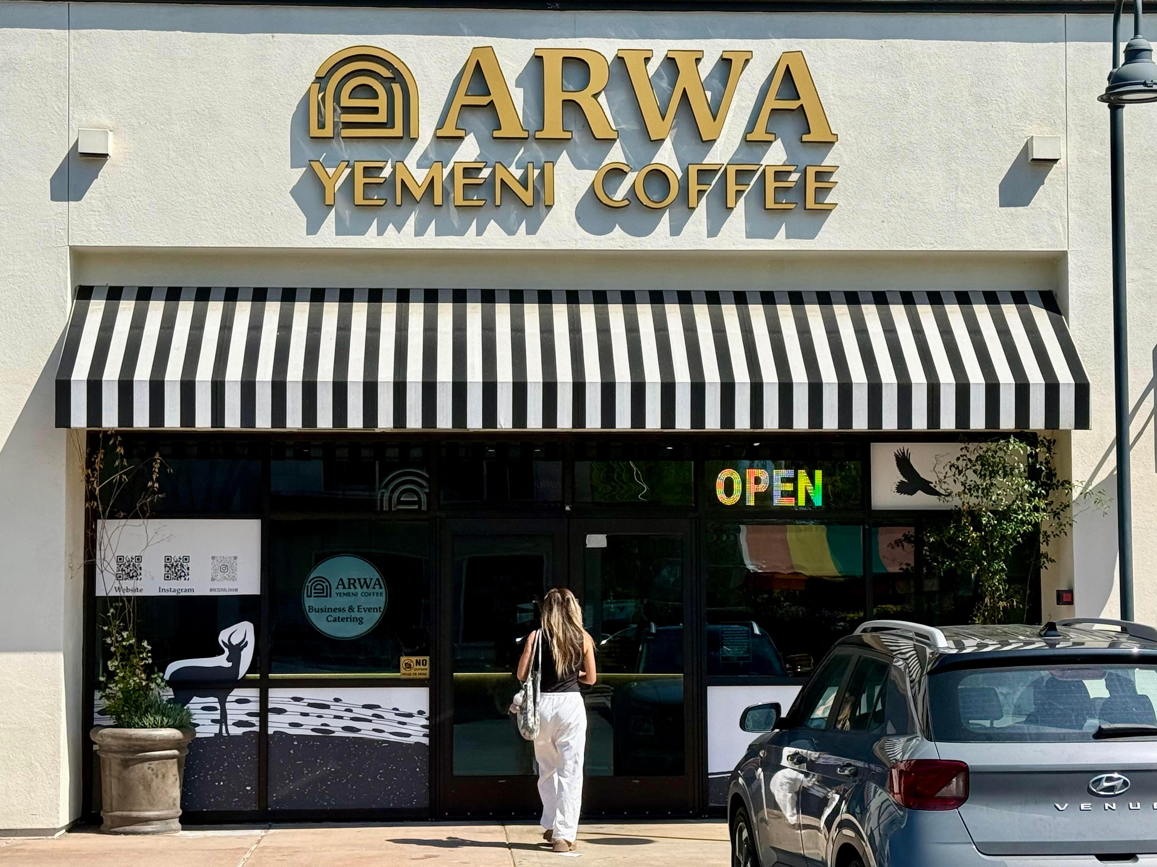 A customer enters Arwa Yemeni Coffee on April 6, 2026,...