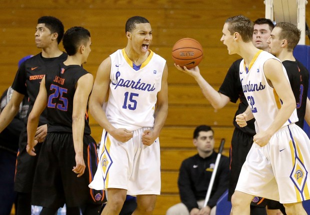 San Jose State guard Brandon Clarke (15) celebrates with forward Ryan Welage after scoring against Boise State during the second half of an NCAA college basketball game in San Jose, Calif., Saturday, March 5, 2016. San Jose State won 68-63. (AP Photo/Jeff Chiu)