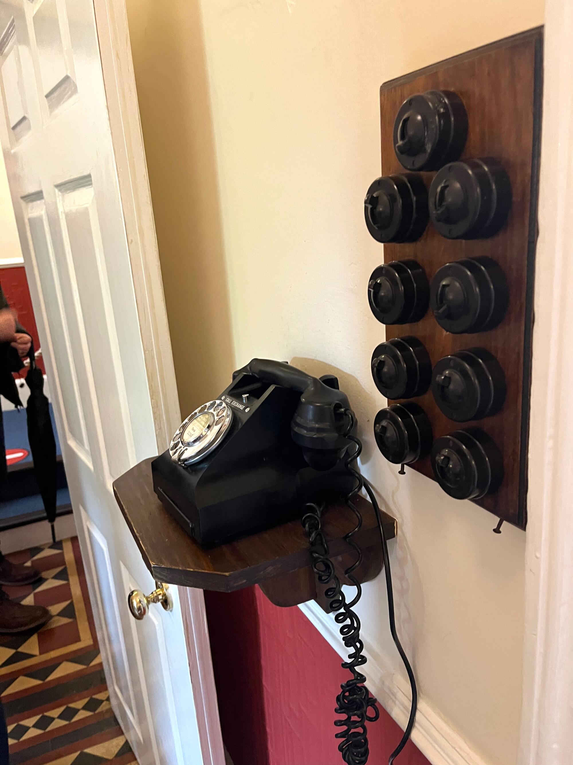 A rotary phone.