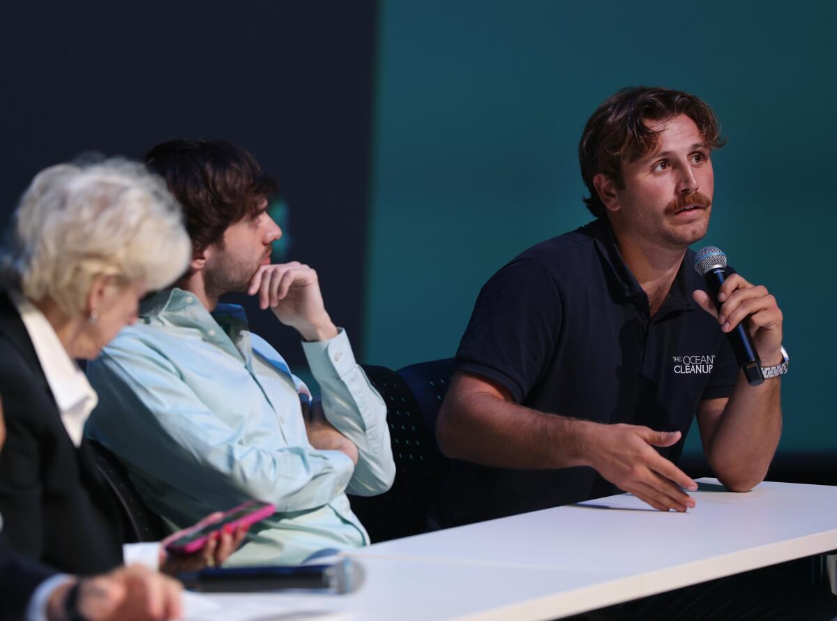James Patterson, right, operations manager for Ocean Cleanup.