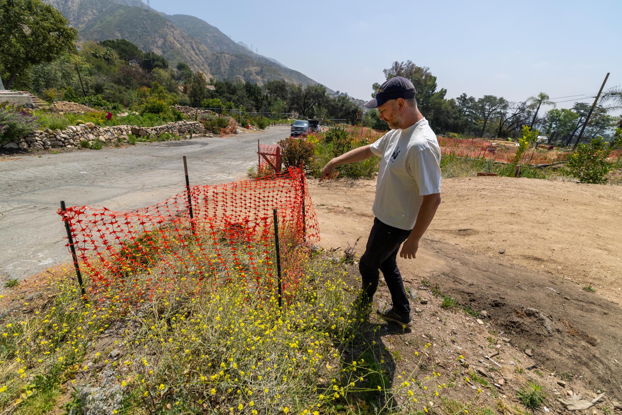 Morgan Whirledge surveys the initial stages of rebuilding at his Altadena lot.