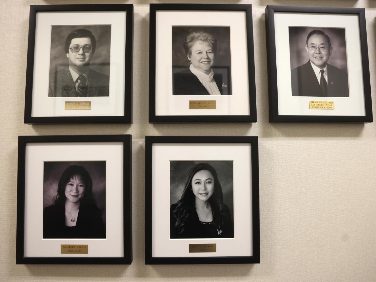 A wall of photographs of former Arcadia mayors inside Arcadia City Hall. 