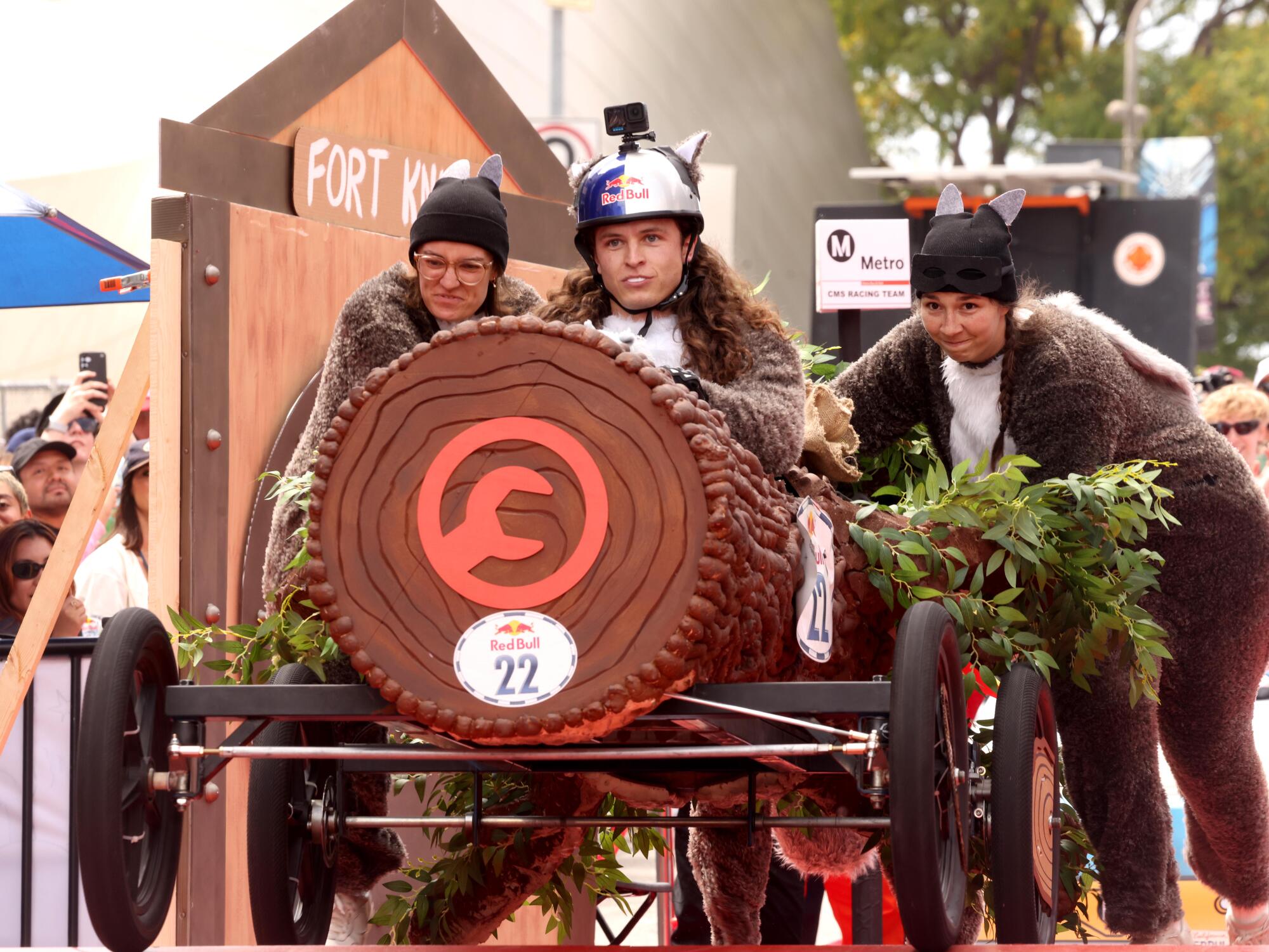 The Operation Nut Job cart is pushed to begin it's decent down 1st Street.