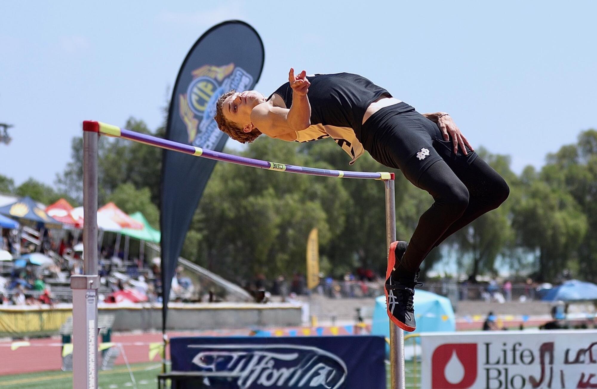 Notre Dame senior JJ Harel clears 7 feet, 1 inch to win the Division 3 high jump title at the Southern Section finals.