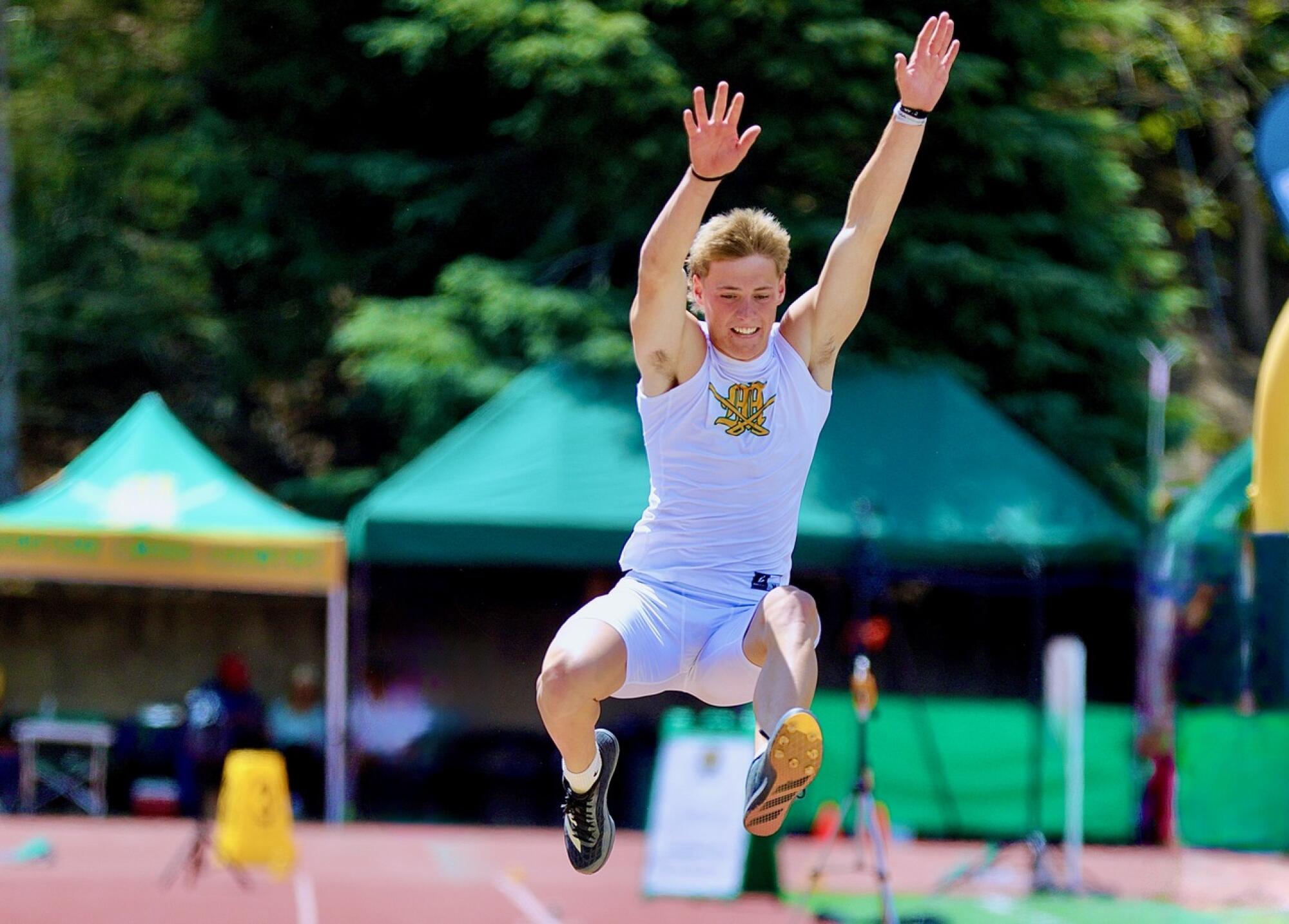 Moorpark’s Davis Benson wins the Division 3 long jump title with a leap of 23 feet, 5 inches on Saturday.