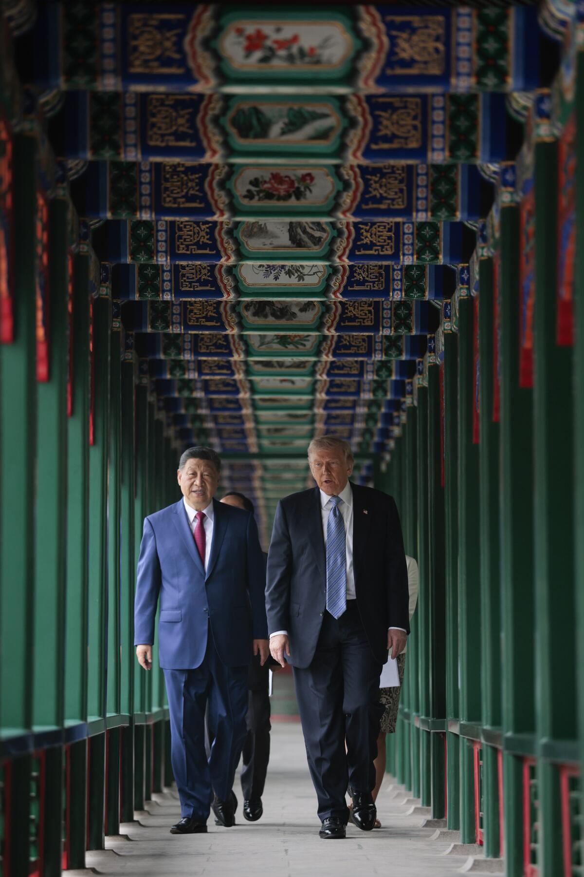 Presidents Xi and Trump tour Zhongnanhai Garden.