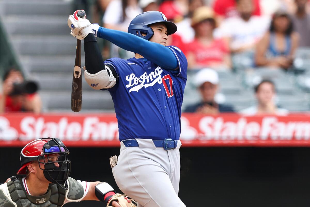 Shohei Ohtani hits an RBI single in the fourth inning.