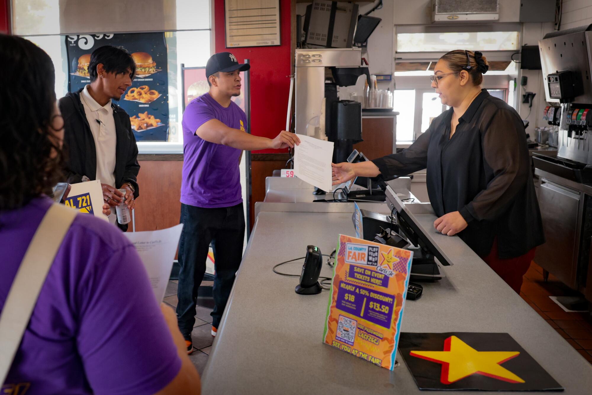 A Carl's Jr. manager receives a demand letter from workers.