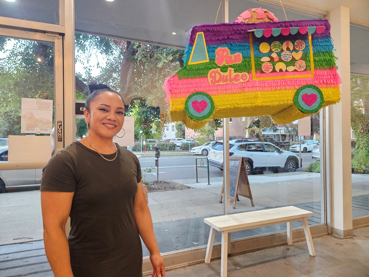 Christina Marenco’s colorful piñata drew on a childhood memory of a pan dulce van bringing baked goods to her family home. She said the design reflected her whimsical remembrance and served as a symbol of togetherness.