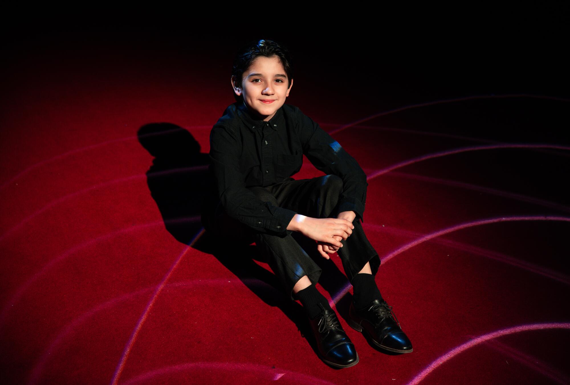 Francesco Caballero, 13, poses for a portrait at the Caballero Circus on Wednesday, May 13, 2026, in Santa Ana.