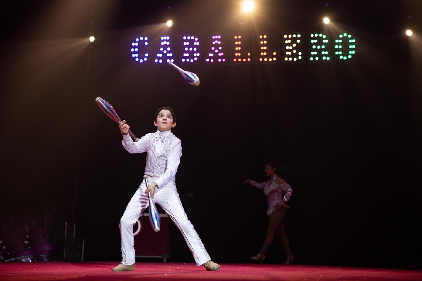 Francesco Caballero, 13, juggles pins during his performance at Caballero Circus on Wednesday, May 13, 2026, in Santa Ana.