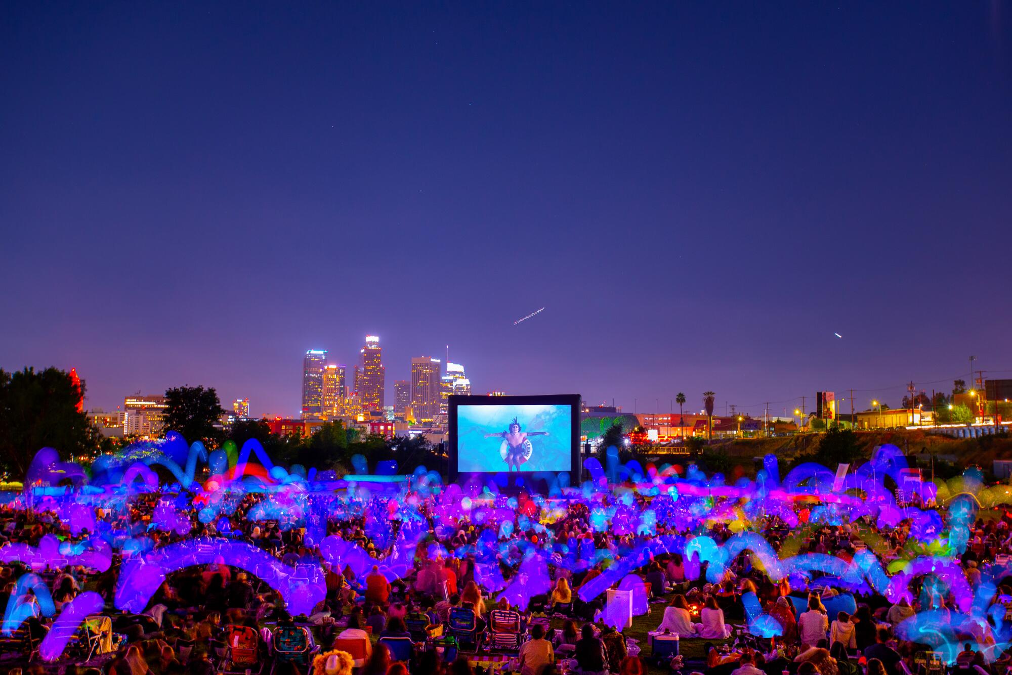 Cinespia event with downtown Los Angeles in the background.