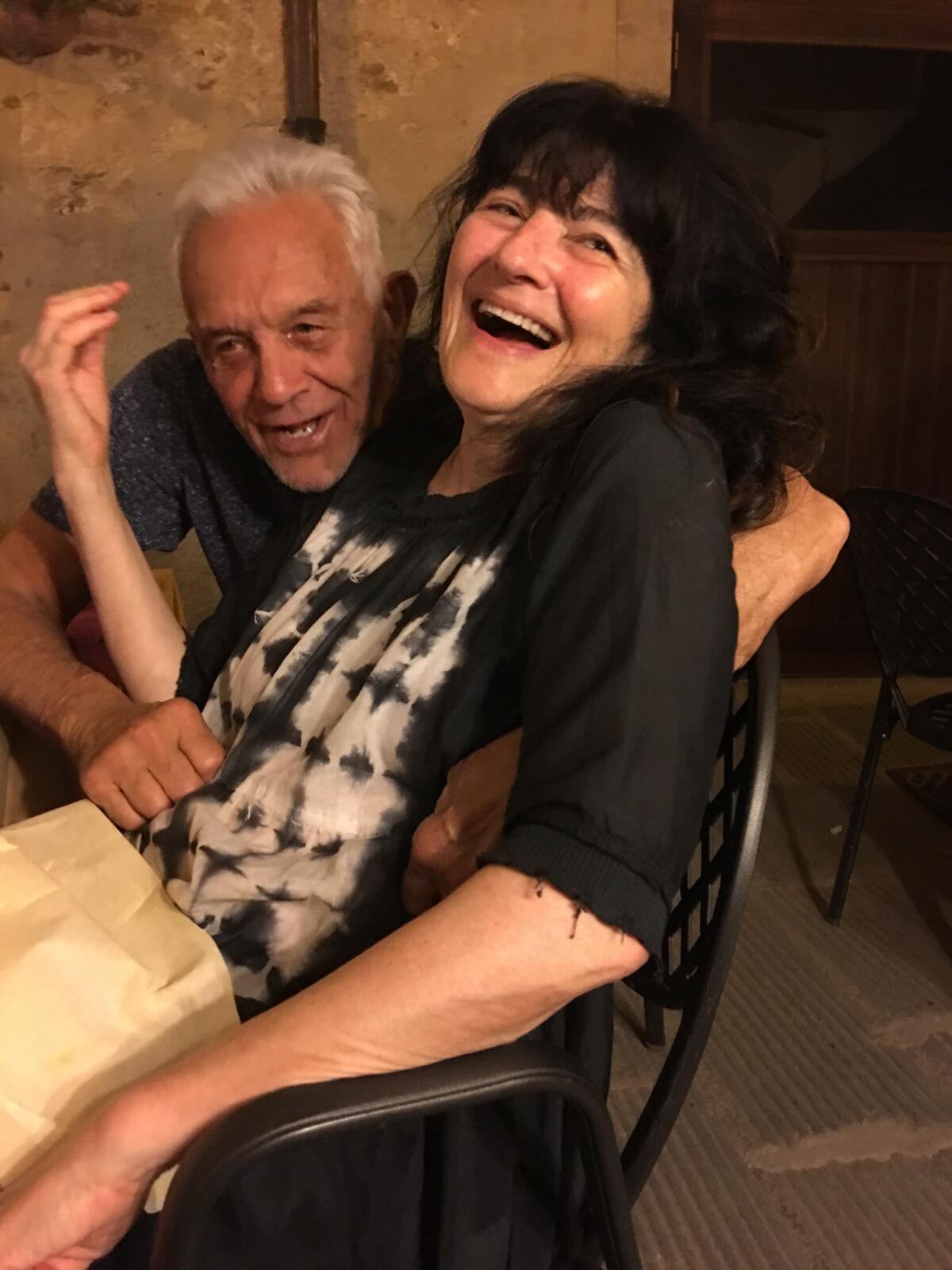 Michael Singer, a.k.a. the Reluctant Gourmet, and former Times food critic Ruth Reichl in 2017 in Panicale, Italy.