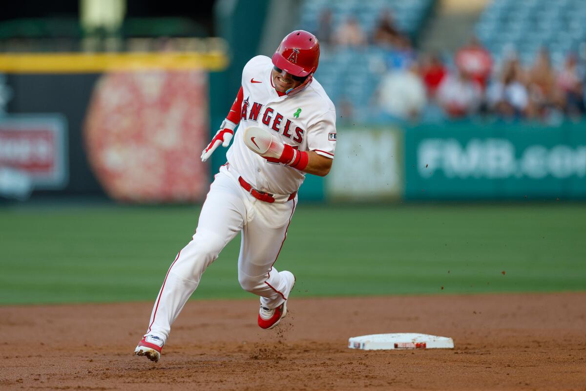 Mike Trout rounds second during the first inning Wednesday.