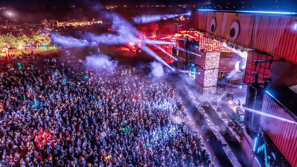 Aerial view shows thousands of attendees at a Lightning in a Bottle stage and festival grounds at Buena Vista Aquatic Recreation Area in Kern County, Calif. (IG/libfestival)