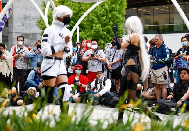 People take pictures at FanimeCon at San Jose McEnery Convention Center in San Jose, Calif., on Sunday, May 28, 2023. (Shae Hammond/Bay Area News Group)
