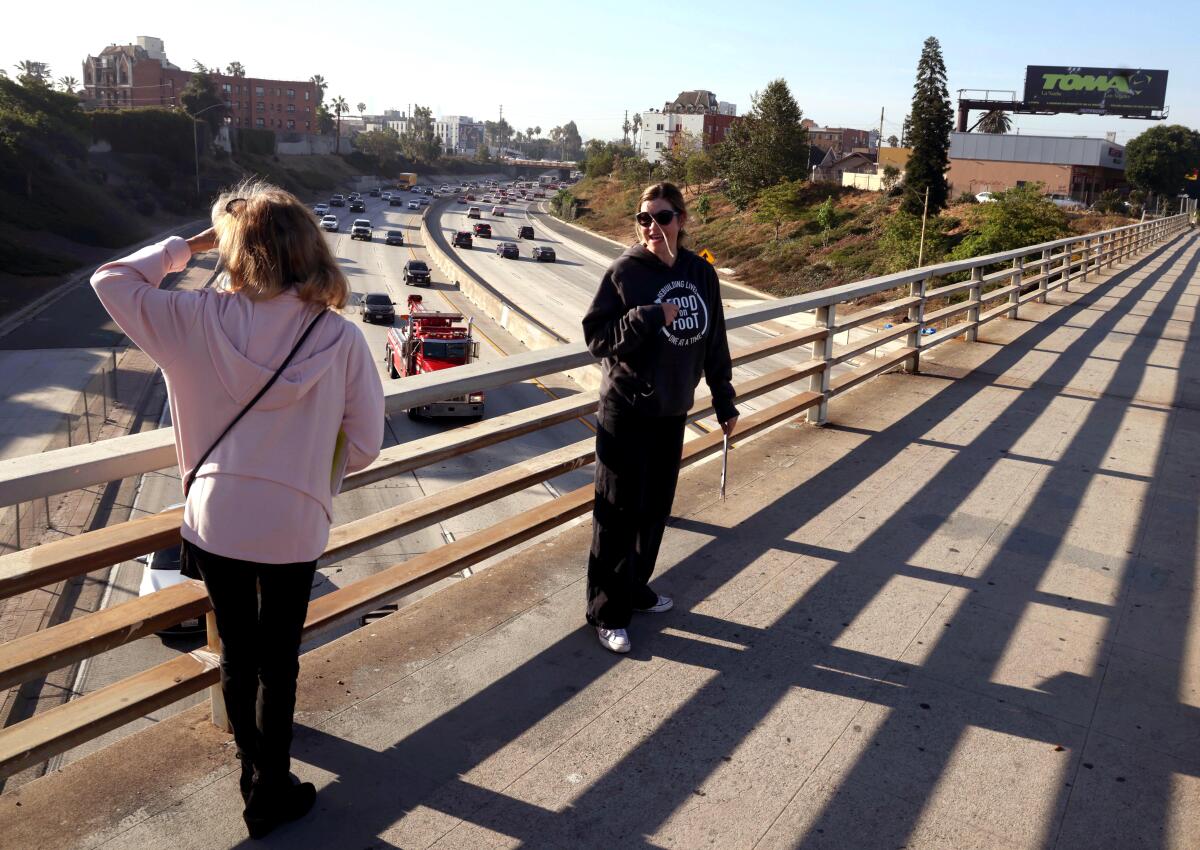 Two woman look to count the homeless living on the streets or in their cars in Hollywood.