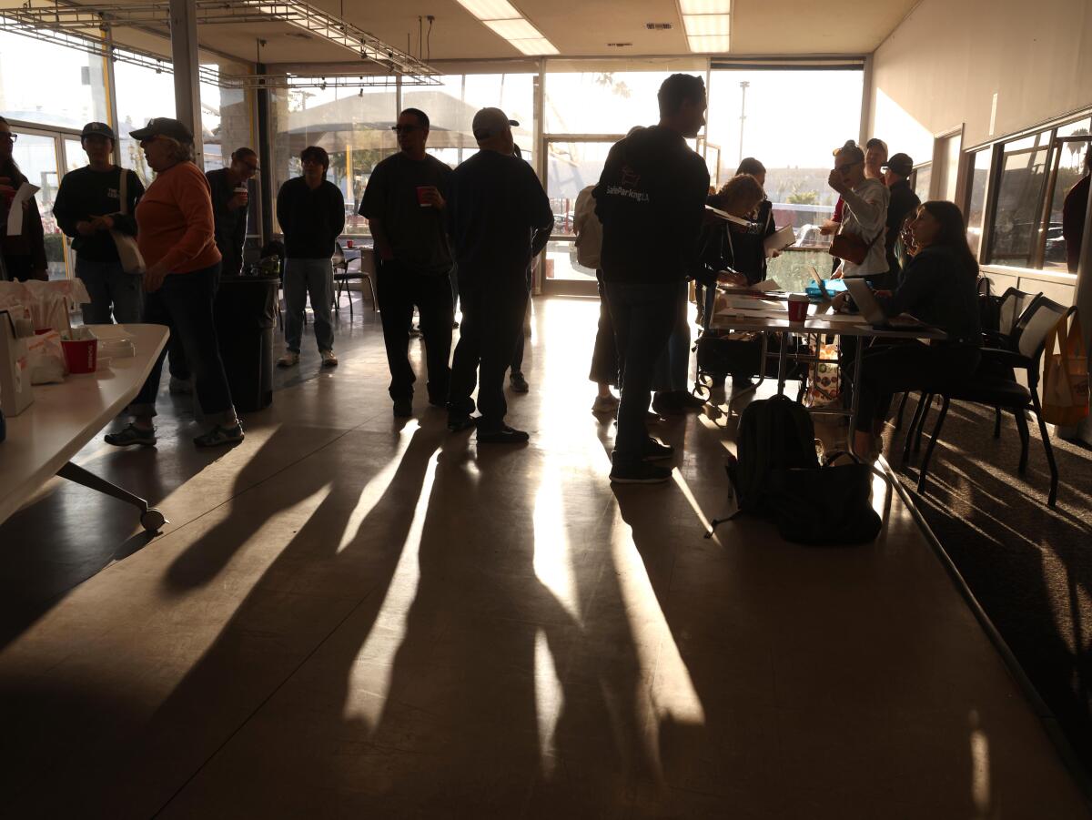 Volunteers receive their assignments while participating in Hollywood4wrd's homeless count.