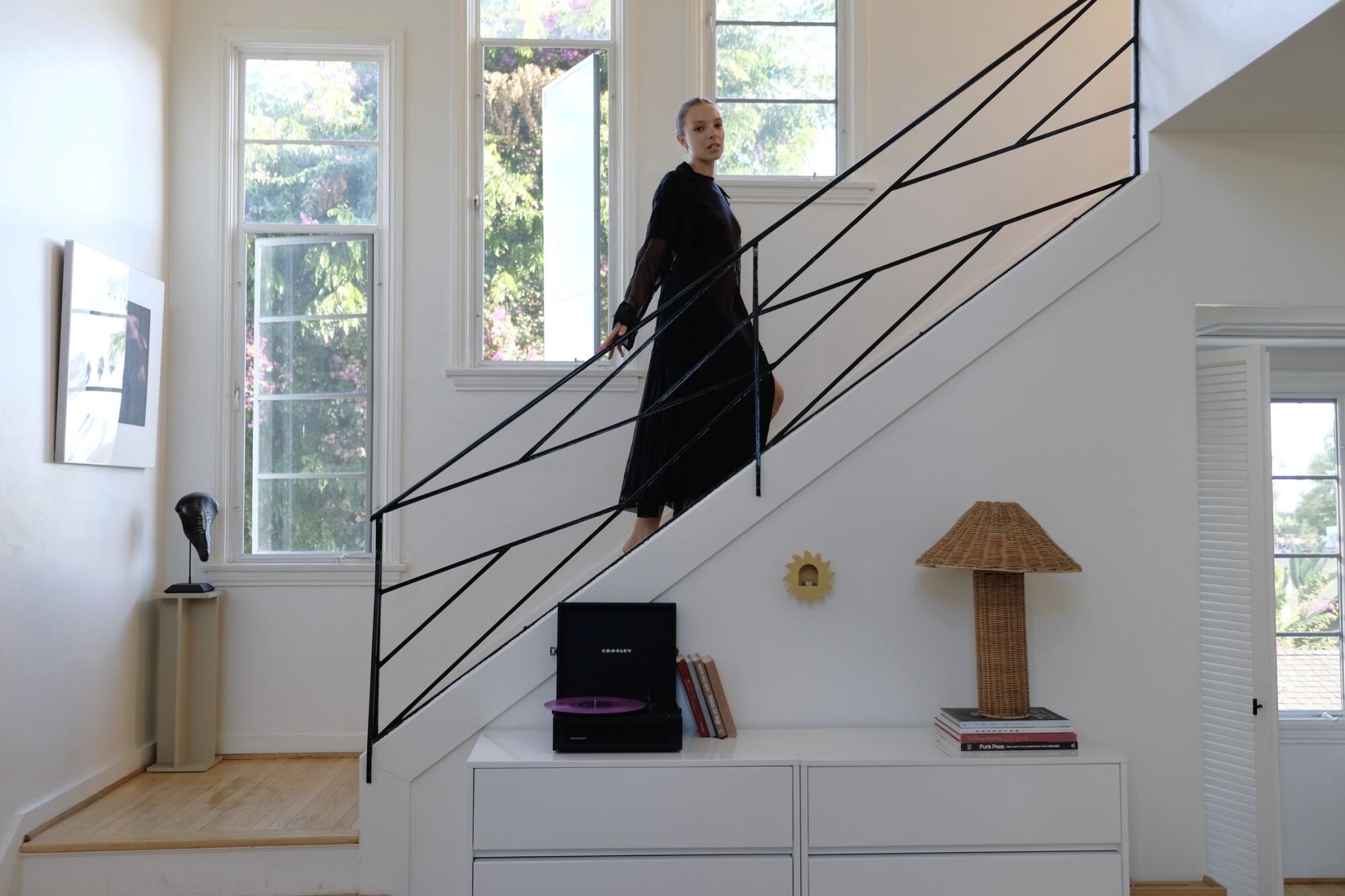 Indya Stewart, an interior designer and apartment scout, inside of a home.