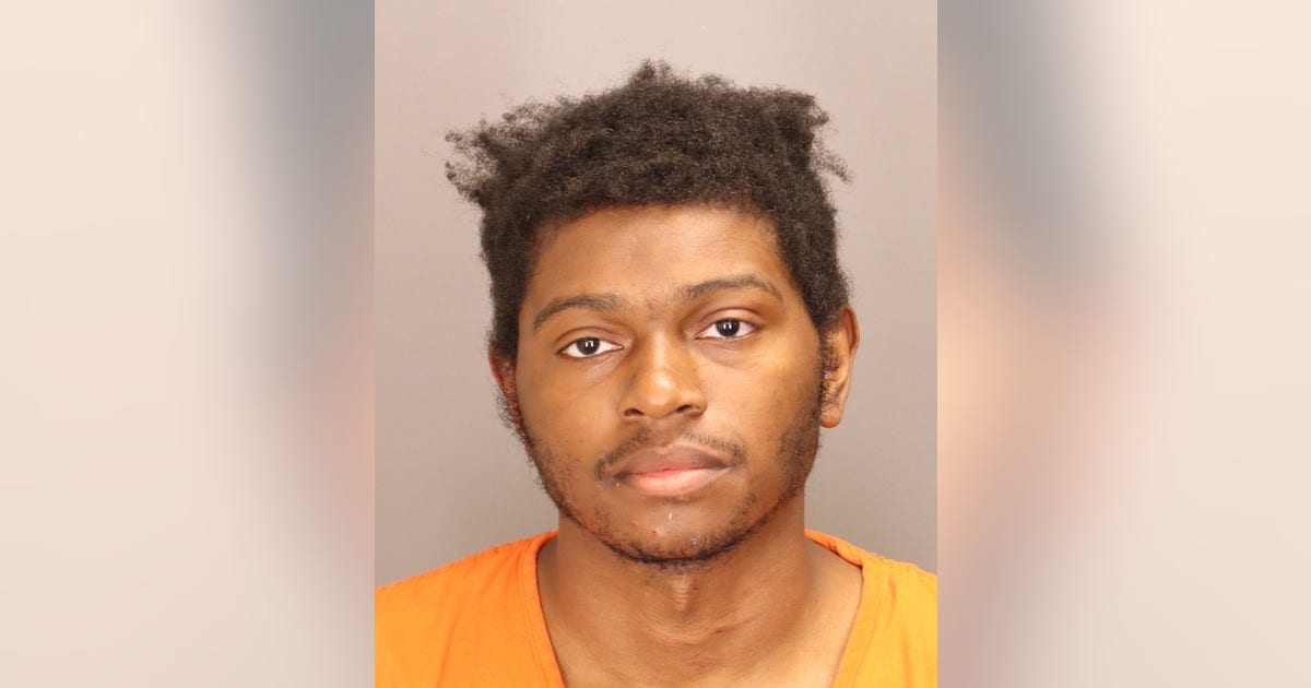 Man charged after woman shot, carjacked outside Oakland County business
