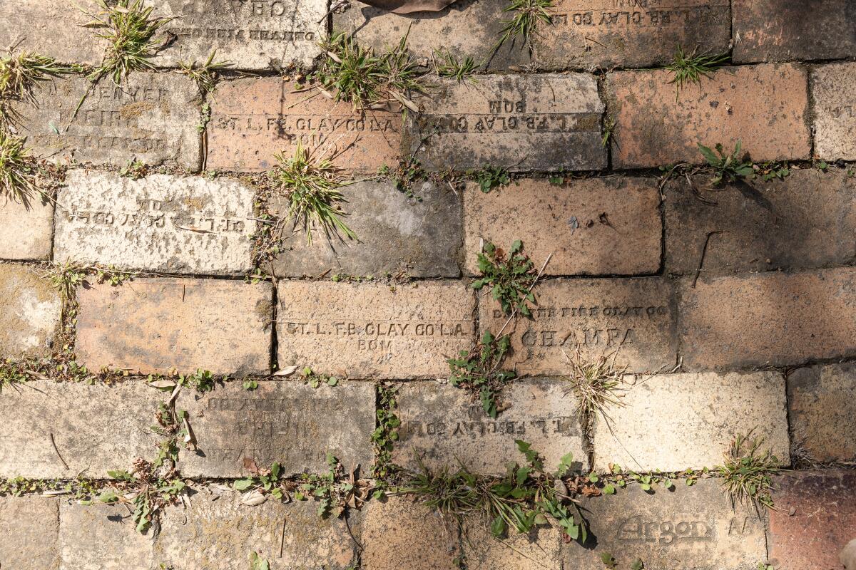 Andri Luescher wants to reuse these vintage bricks for his new house development in Mount Washington.