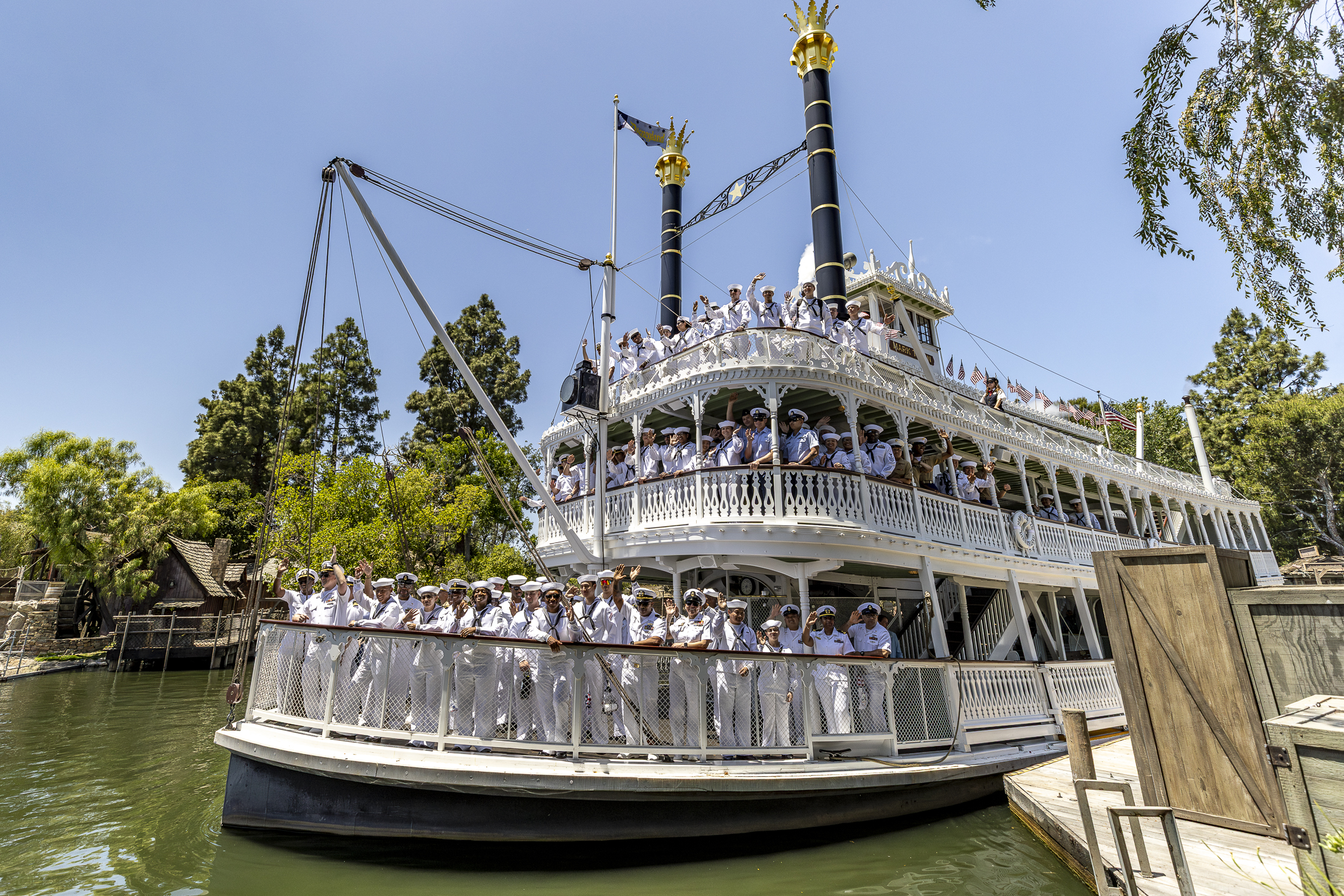U.S. Sailors, Marines and Coast Guardsmen ride the Mark Twain...