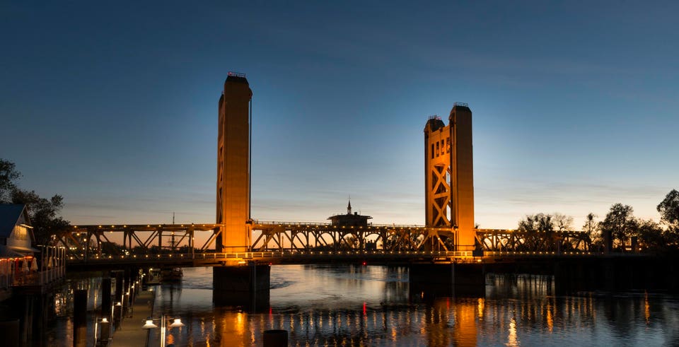 The Tower Bridge is a vertical lift bridge across the Sacramento River, linking West Sacramento in Y
