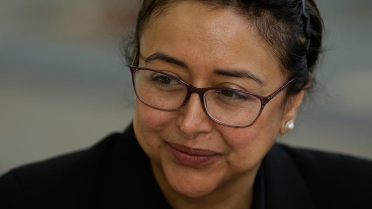 Attorney Dr. Nidaa Pervaiz is interviewed outside of Immigration Court...