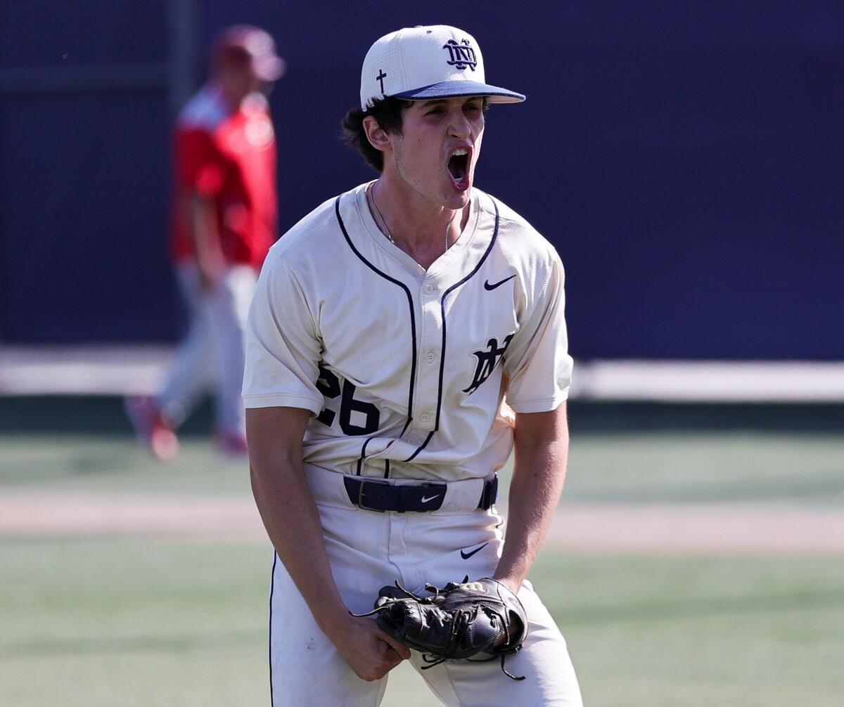 AJ LaSota lets out a roar after a strikeout in Sherman Oaks Notre Dame's 7-2 win over Corona.