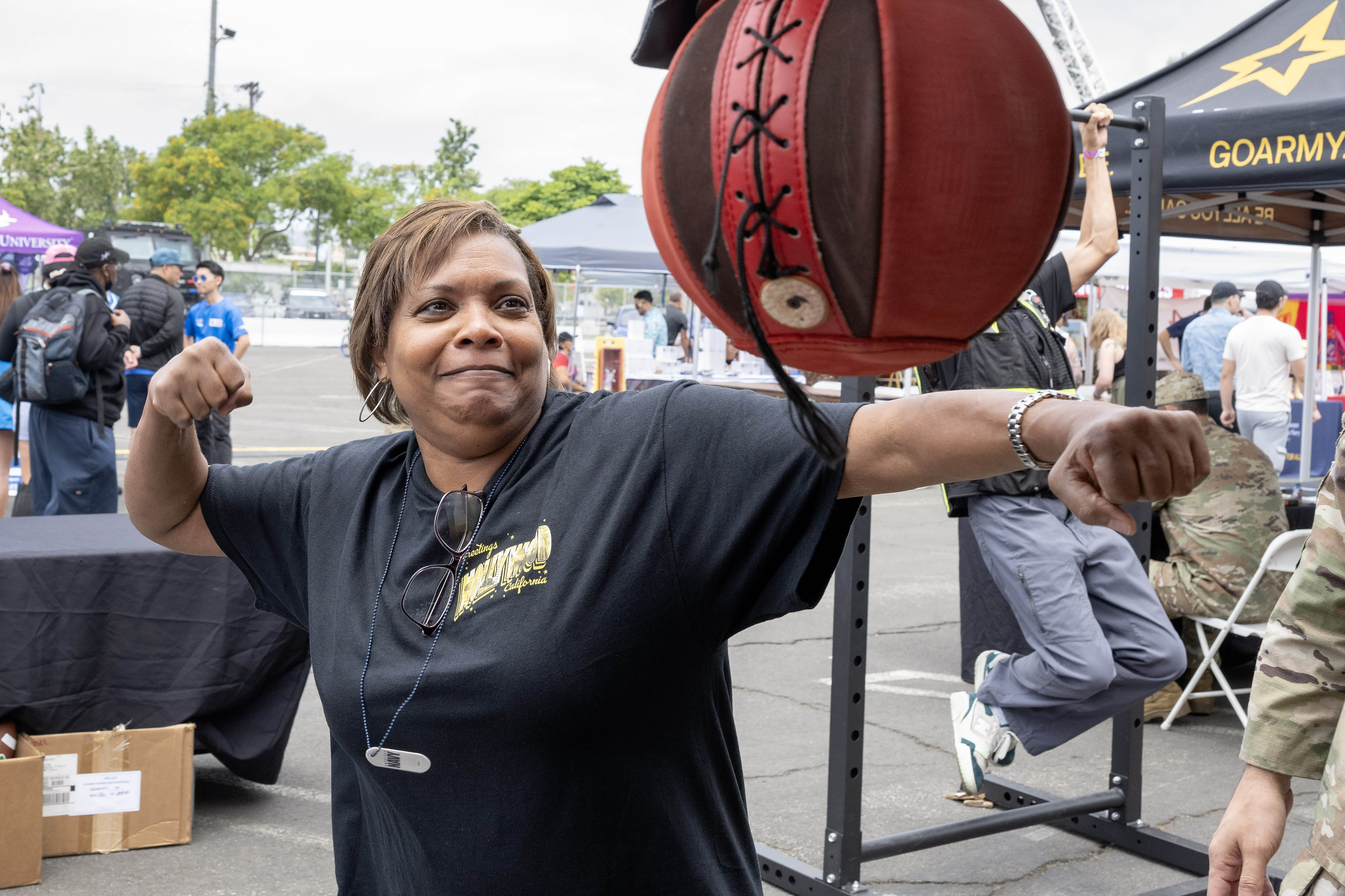 Carolyn Surratt of Texas tests her punching power during day...