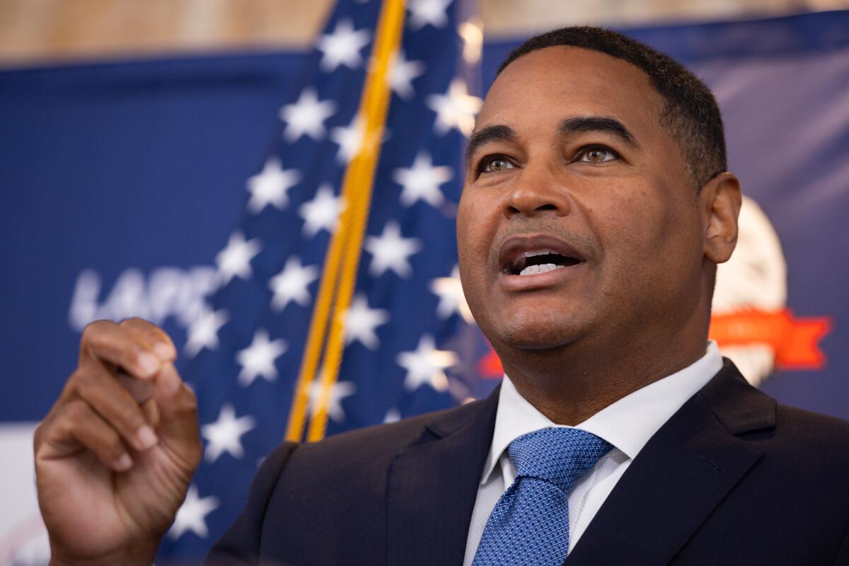 John McKinney speaks during a news conference.