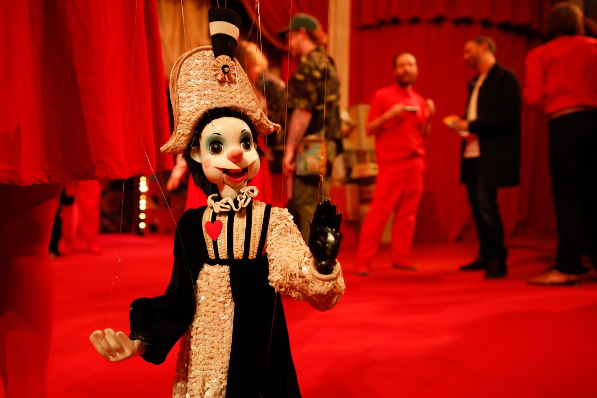 Ginger Duncan twirls the marionette “Comedy,” after the premiere of “Choo Choo Revue."