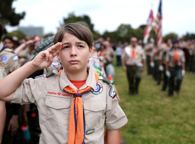 Max Medellin of Troop 10 from Reseda salutes.