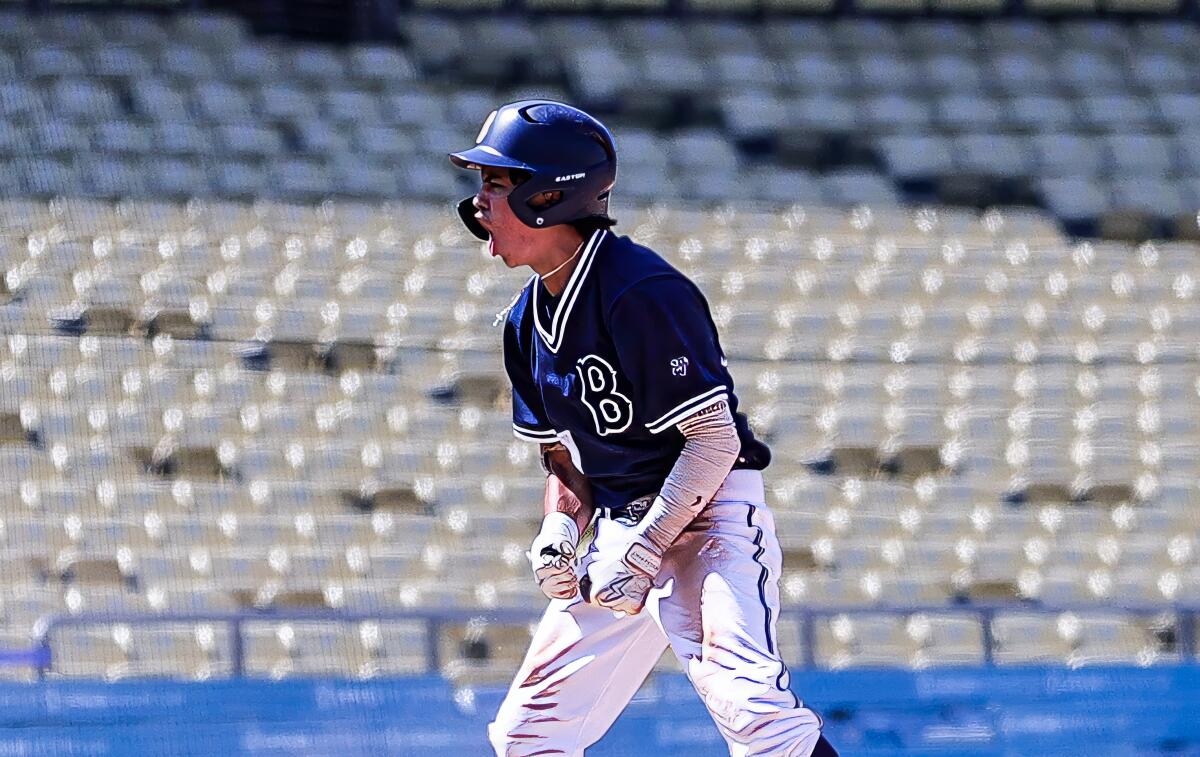 Outfielder Masen Ruiz of Birmingham roars after his three-run triple in the fifth inning at Dodger Stadium