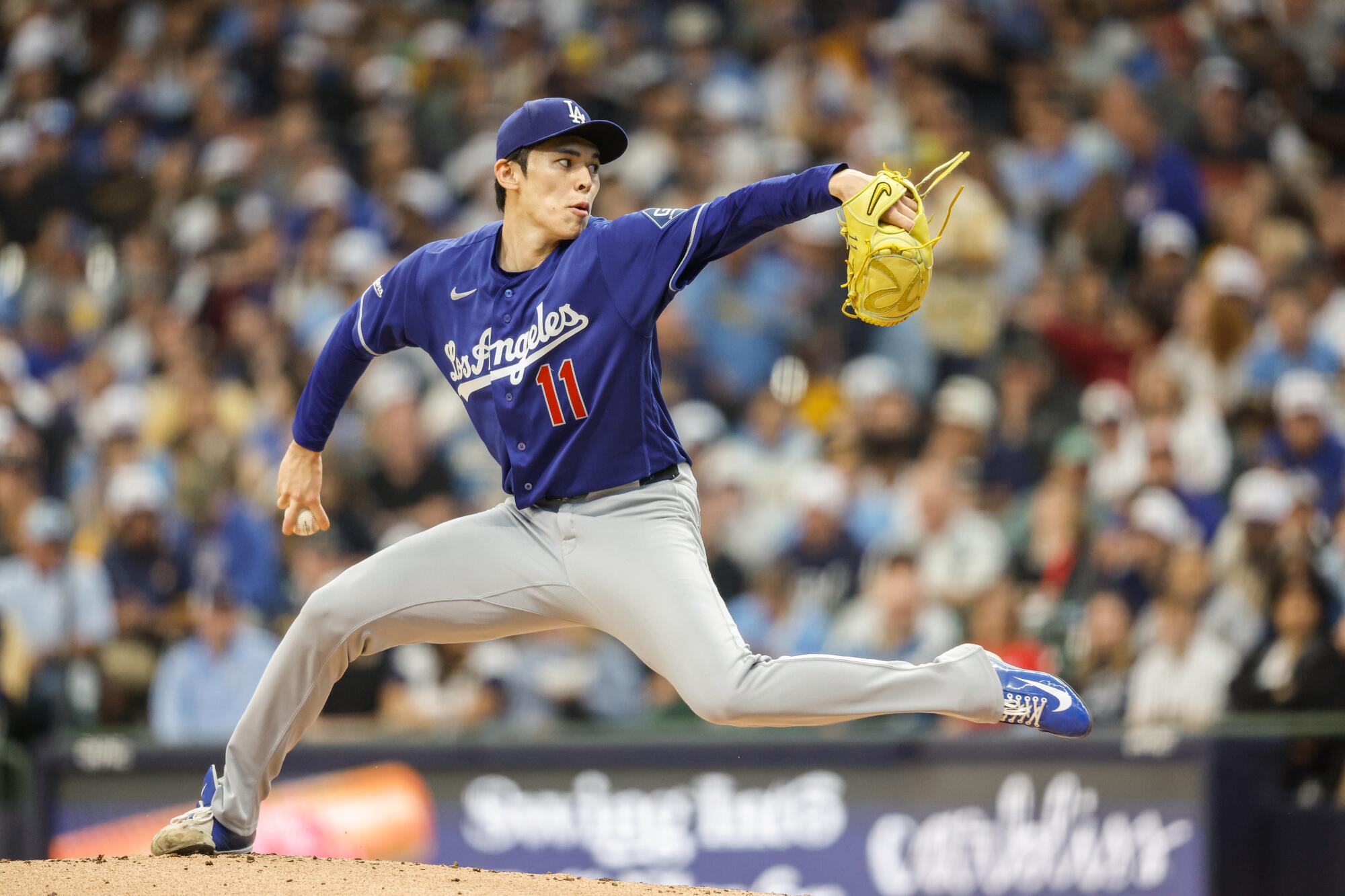 Dodgers pitcher Roki Sasaki throws during the first inning of a win over the Brewers Saturday in Milwaukee. 