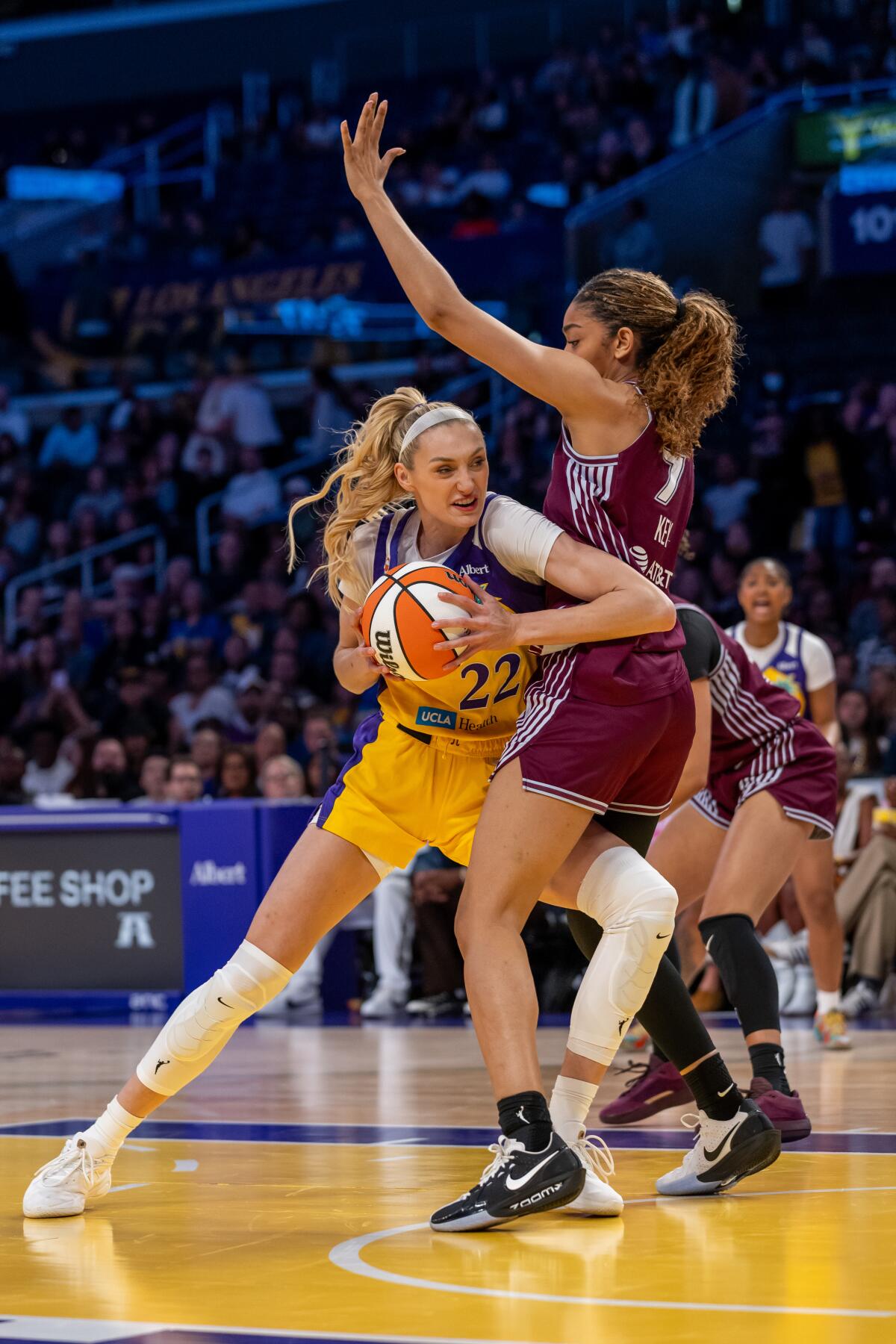 Sparks forward Cameron Brink, left, tries to power her way past a Tempo defender during agame May 15.