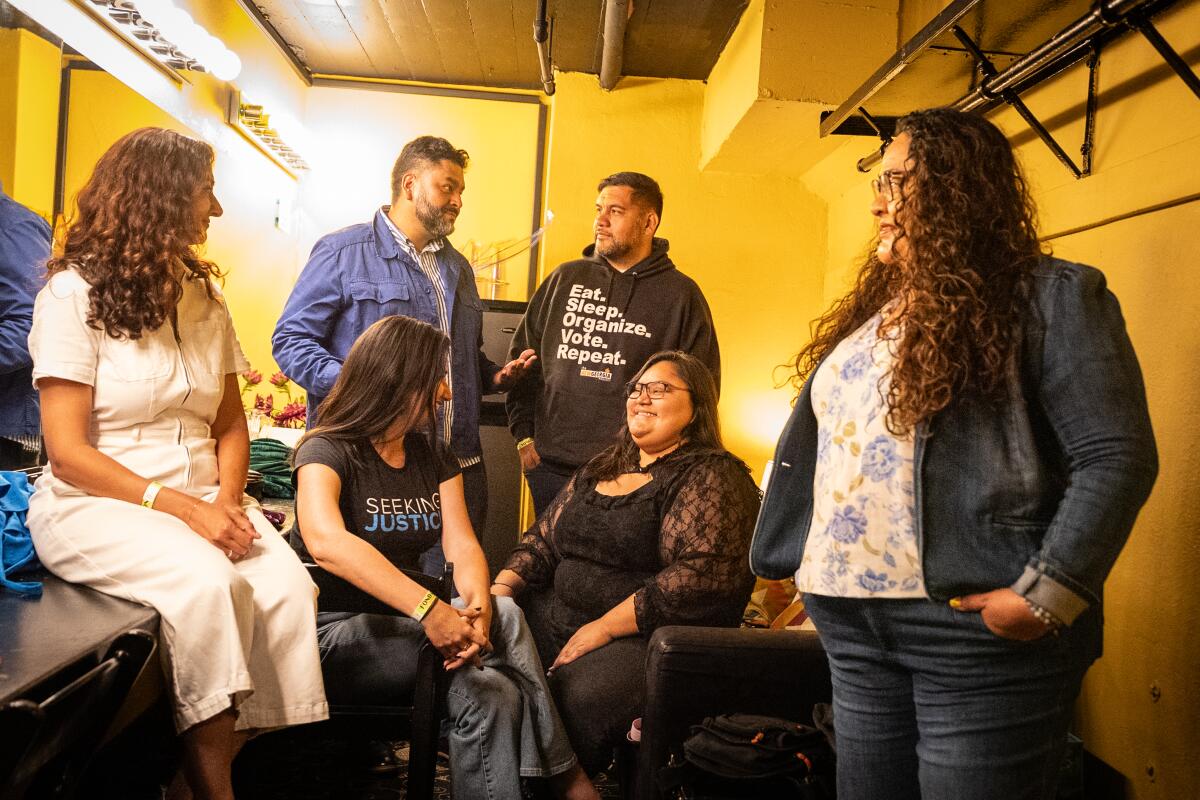 Hugo Soto-Martinez, Eunisses Hernandez, Estuardo Mazariegos, Faizah Malik, Marissa Roy and Rocio Rivas talk backstage.