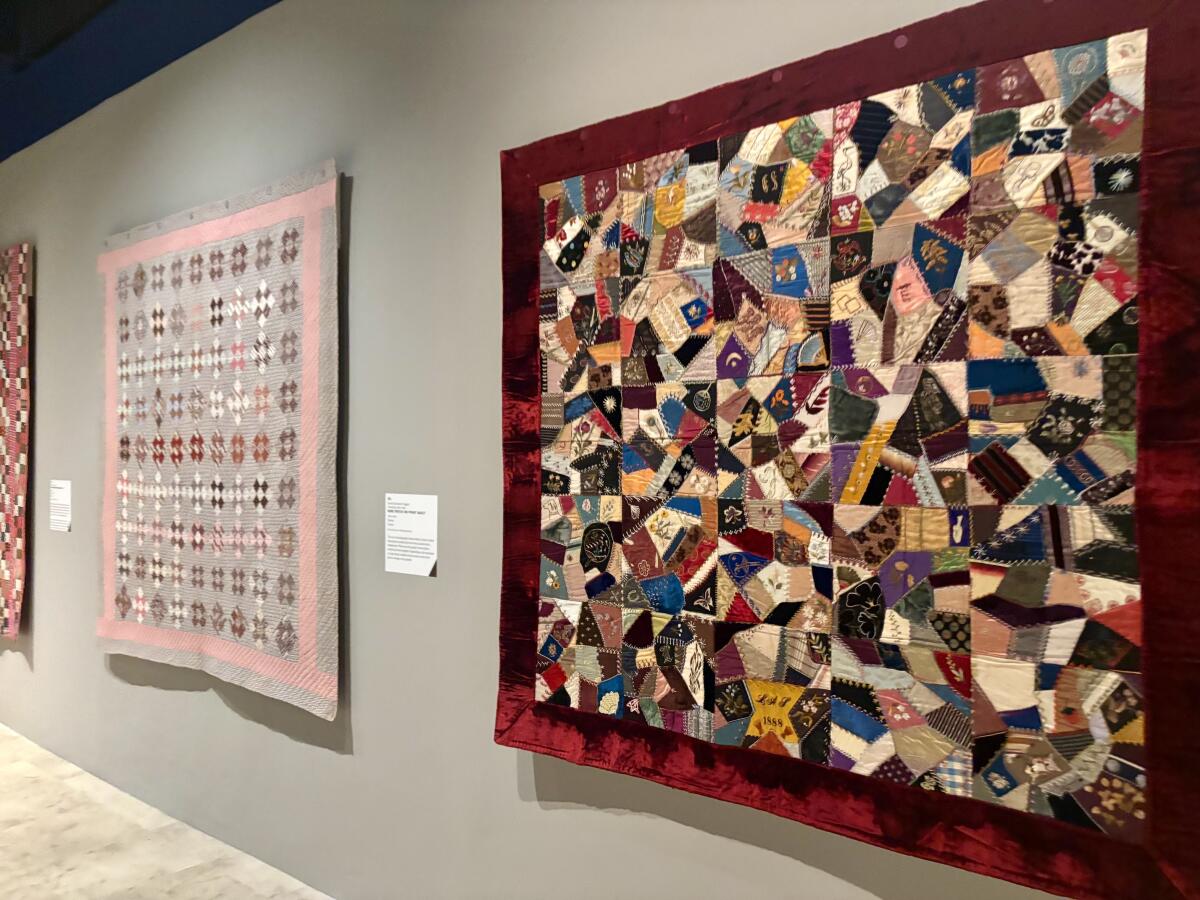 Quilts on display as part of Bowers Museum's “The American Quilt: Cloth and Commerce” exhibition.